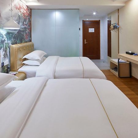Insail Hotels Airport Road Гуанчжоу Экстерьер фото