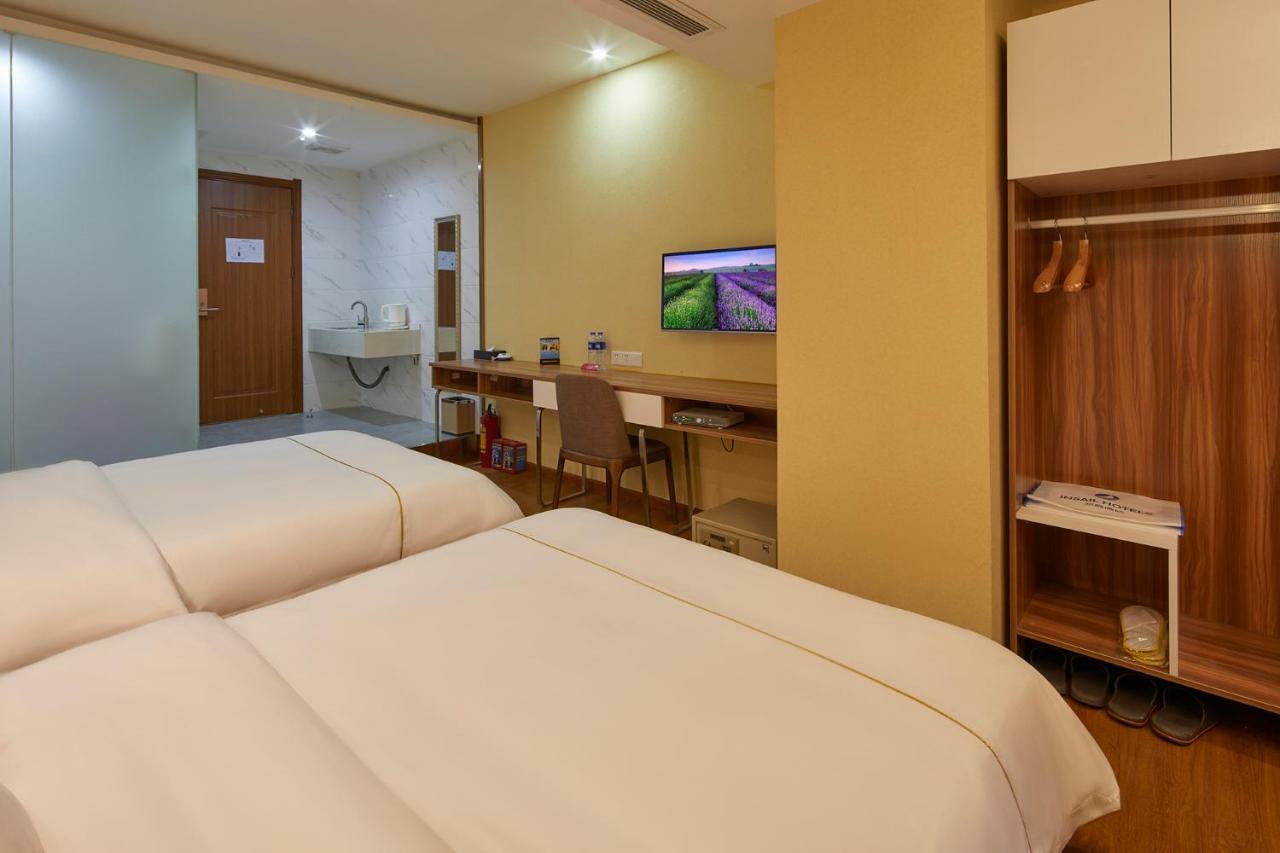 Insail Hotels Airport Road Гуанчжоу Экстерьер фото